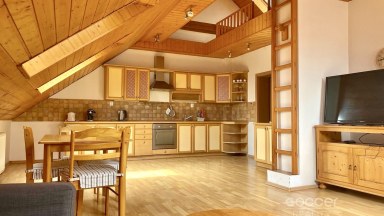 Atypický podkrovní byt 2+kk v atraktivním centru města. 